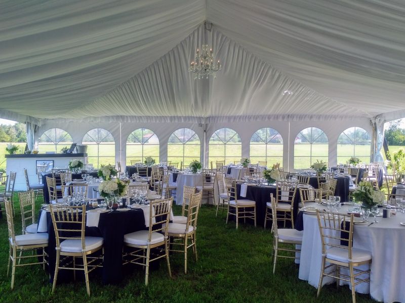 40 x 100 tent inside with liner, chandelier and chiavari chairs